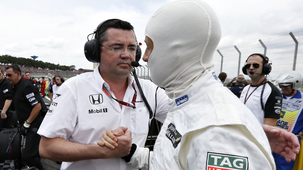 Eric Boullier a Jenson Button v Brazílii