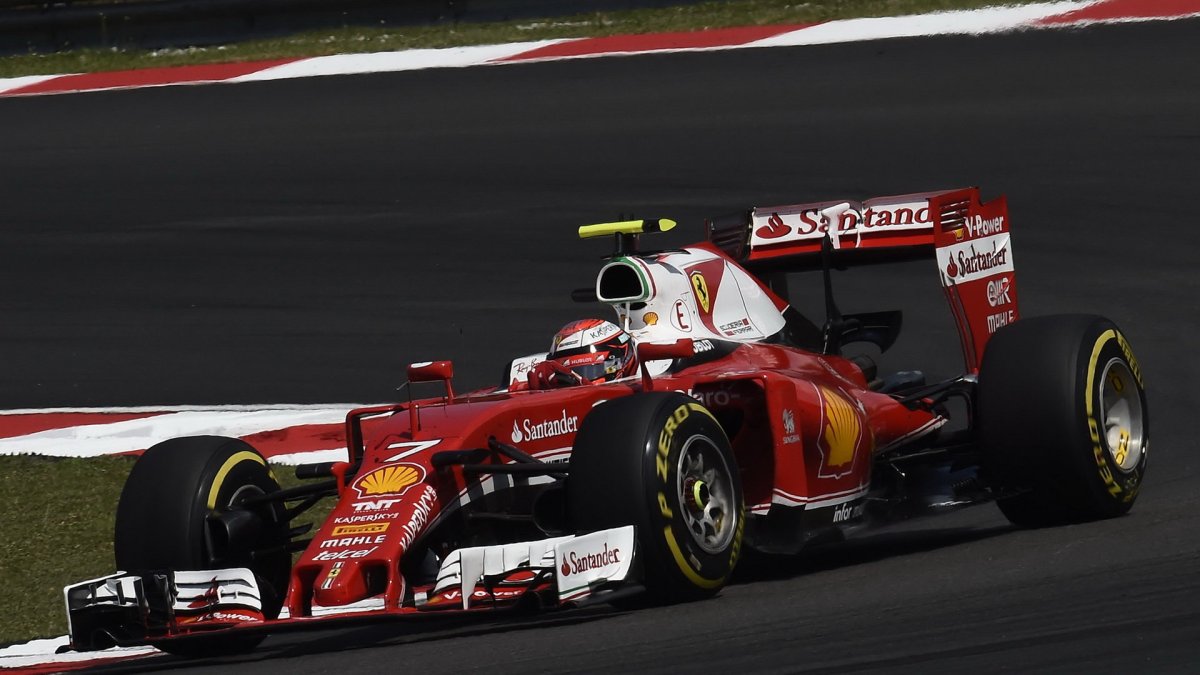 Kimi Räikkönen v závodě v Malajsii
