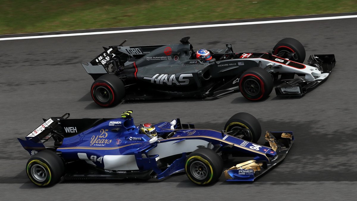 Pascal Wehrlein a Romain Grosjean v závodě v Malajsii