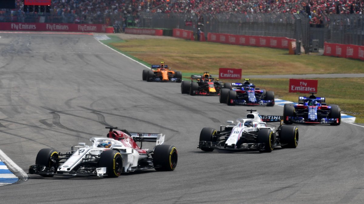 Marcus Ericsson a Lance Stroll v závodě v Německu