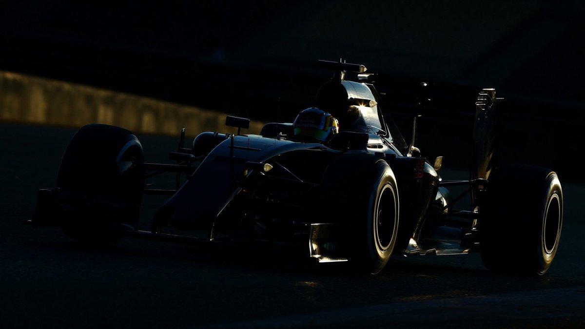 Carlos Sainz s novým vozem Toro Rosso STR11 - Ferrari