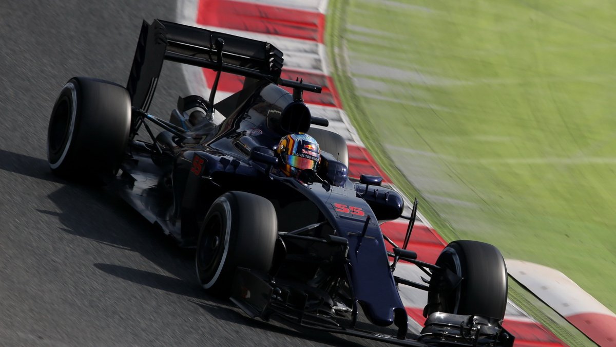 Carlos Sainz s novým vozem Toro Rosso STR11 - Ferrari