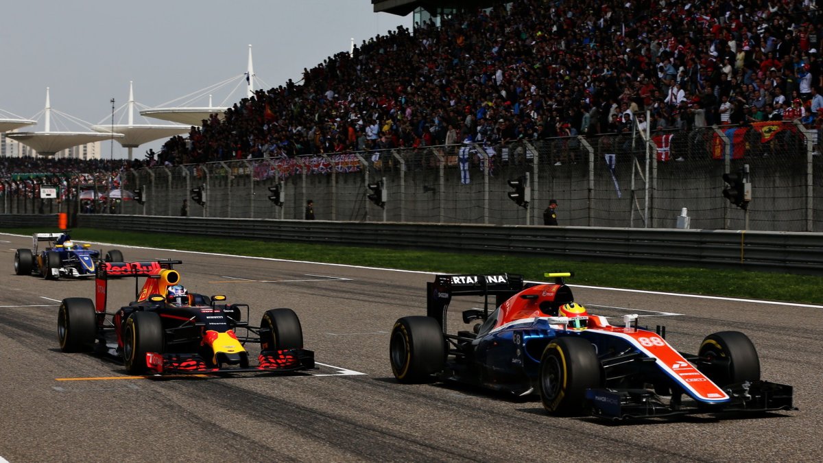 Daniel Ricciardo a Rio Harjanto v závodě v Číně