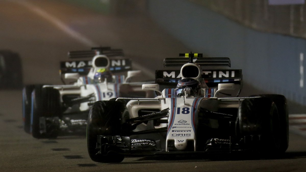 Lance Stroll a Felipe Massa v závodě v Singapuru