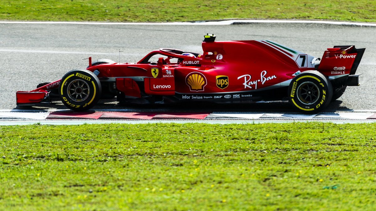 Kimi Räikkönen v závodě v Číně