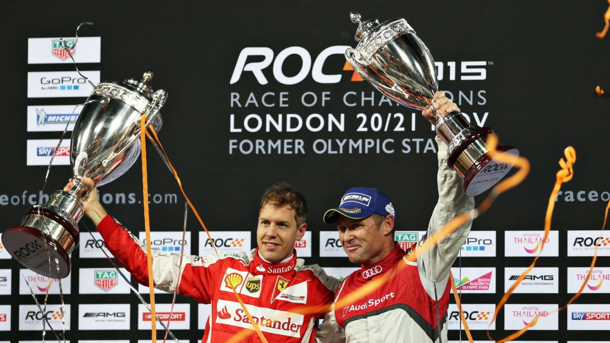 Sebastian Vettel a Tom Kristensen na podiu Race of champions
